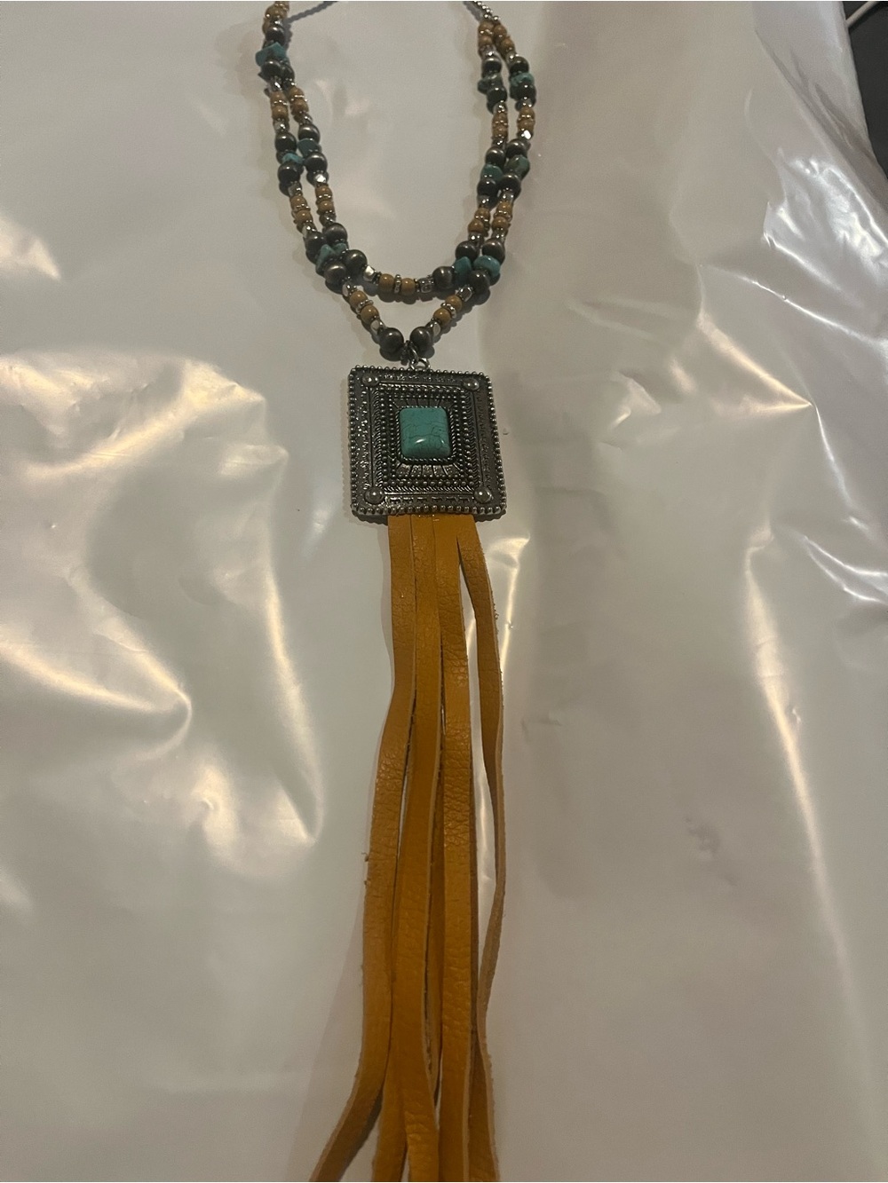 Turquoise Beaded Necklace with Mustard Leather Tassel